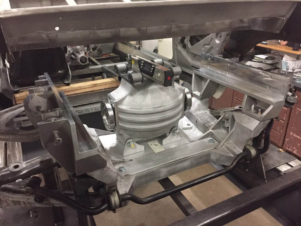 A machine that is making something out of metal.