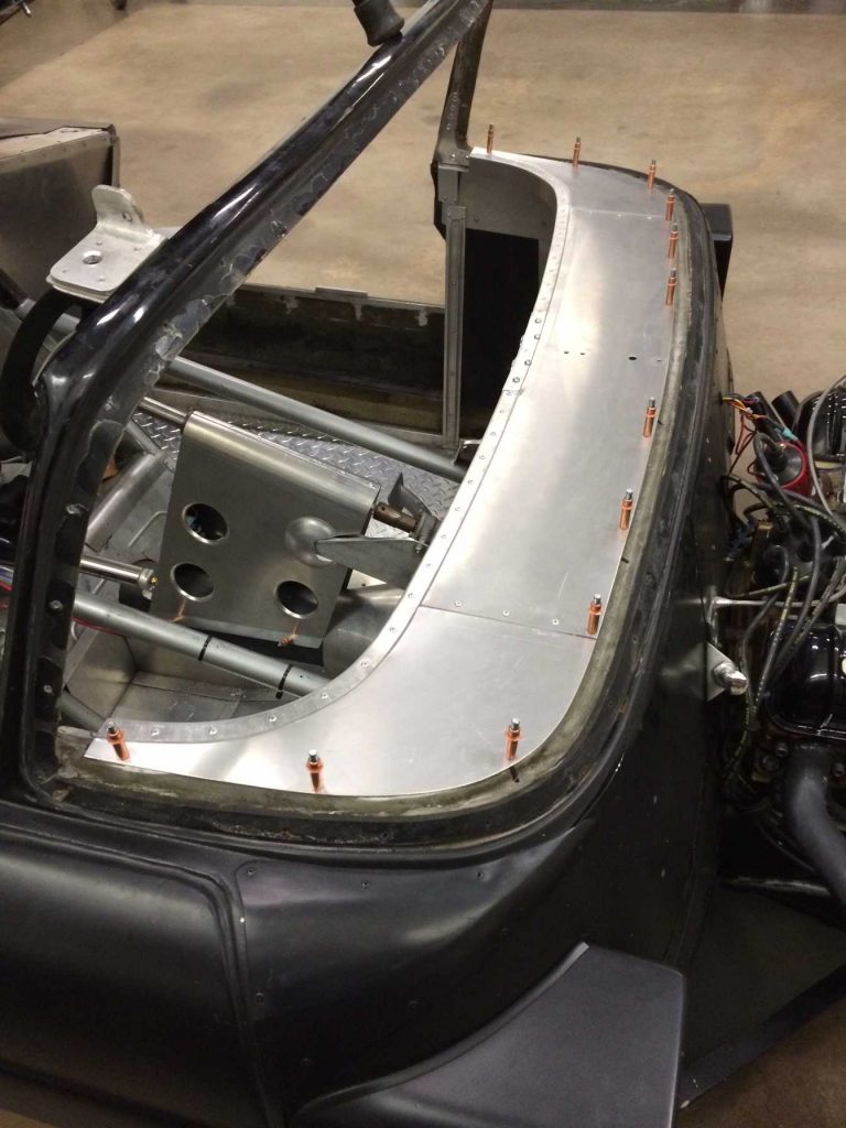 Custom car's aluminum interior panel install.
