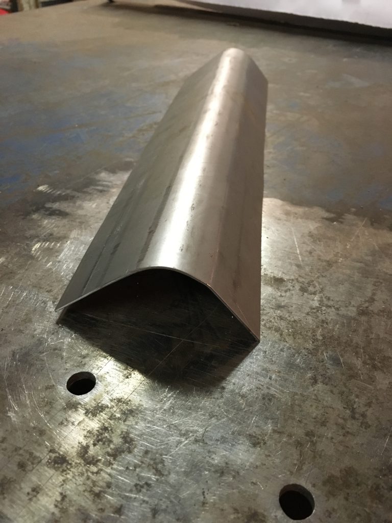Metal sheet metal curved piece.