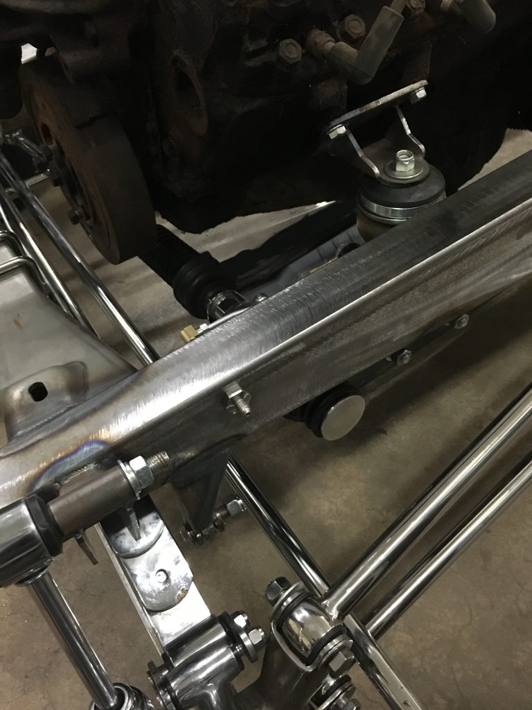 Custom car chassis engine mount detail.