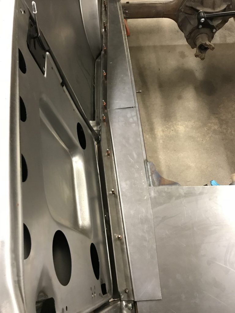 Car body panel installation progress.