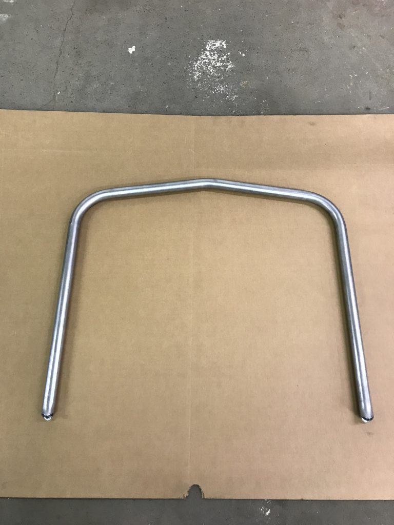 Here's an alt tag for the image: Metal U-shaped frame component.