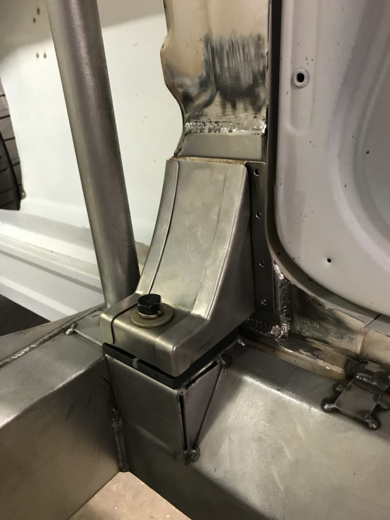 Welded metal bracket and support structure.
