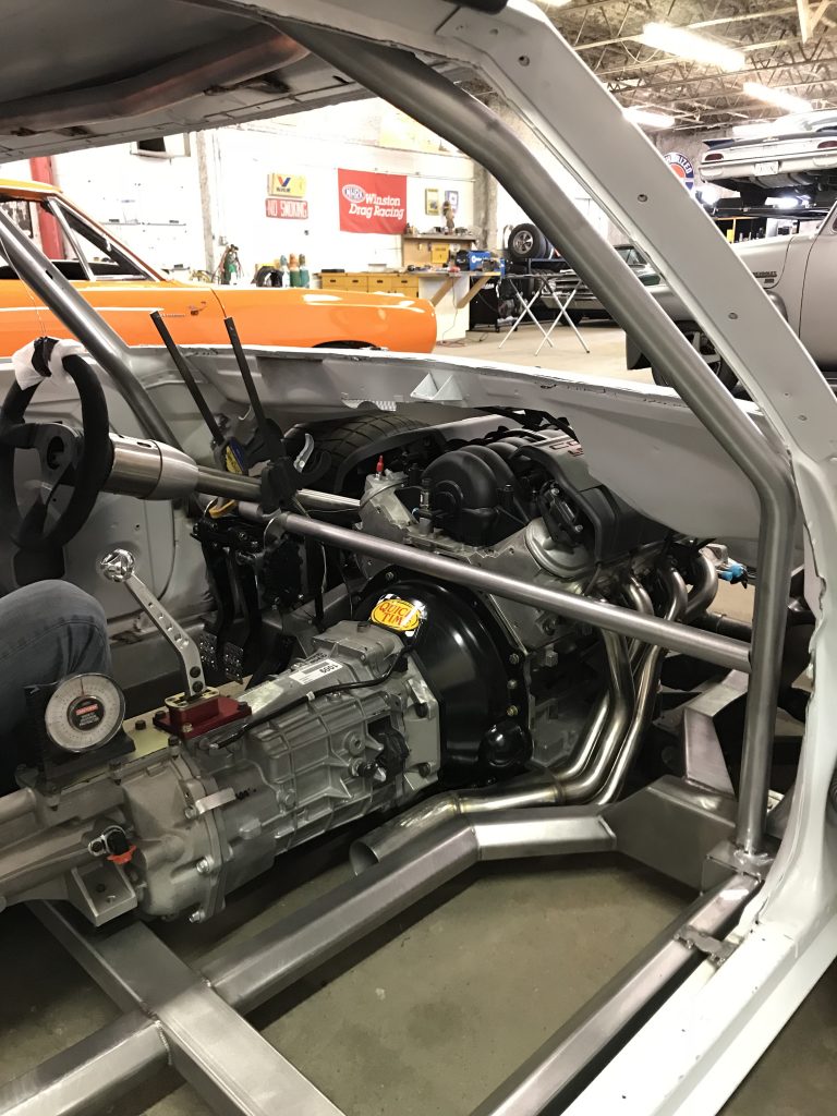 Race car engine and transmission installation.